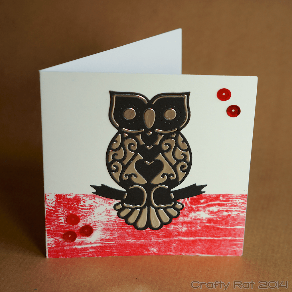 Inlaid die-cut owls