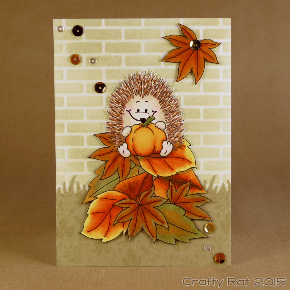 hedgehog on leaf pile