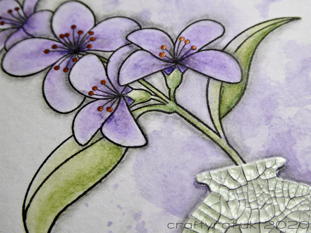 Close-up of the flowers and the top of the vase.