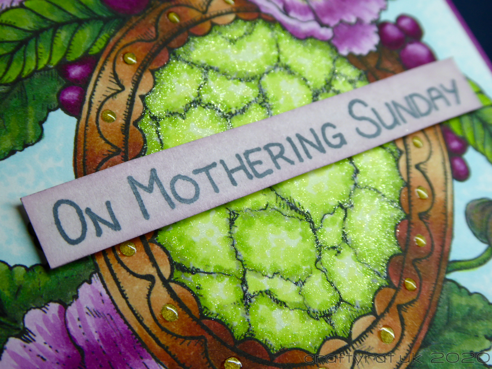 Close-up shot of the card focusing on the sentiment "on Mothering Sunday" across the green gemstone.