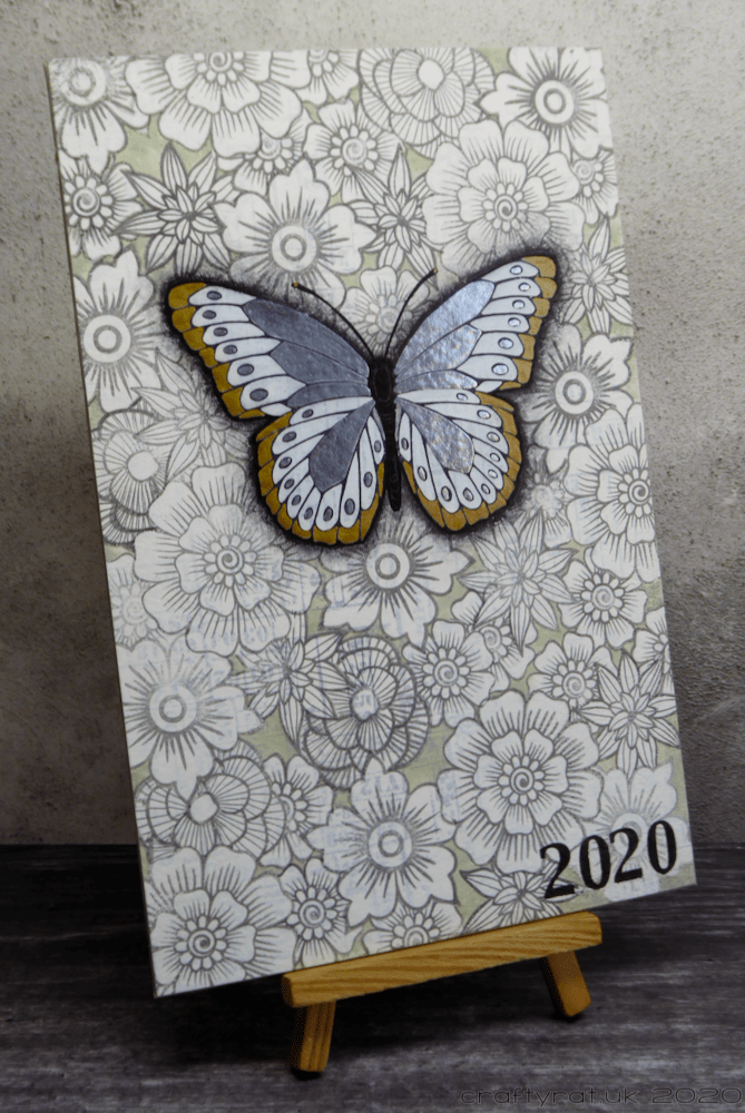 Journal cover displayed on a mini easel.