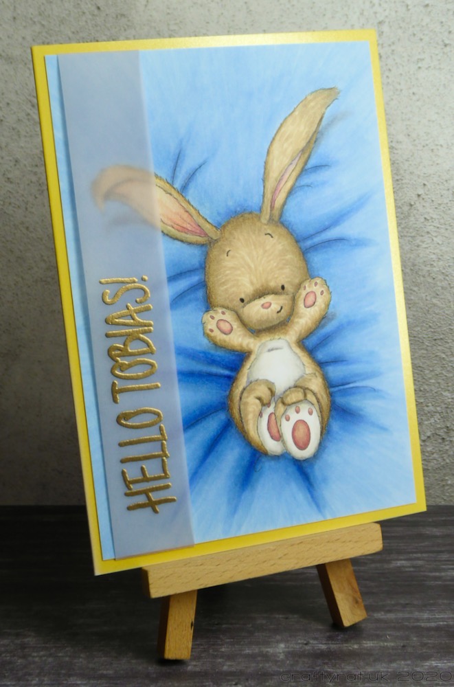 The card displayed on a small wooden easel.