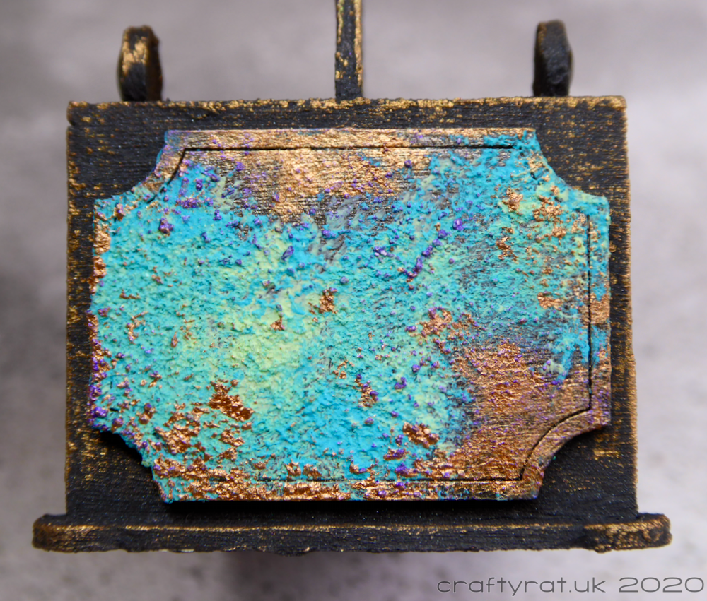 The end of the planter showing the patina effect.