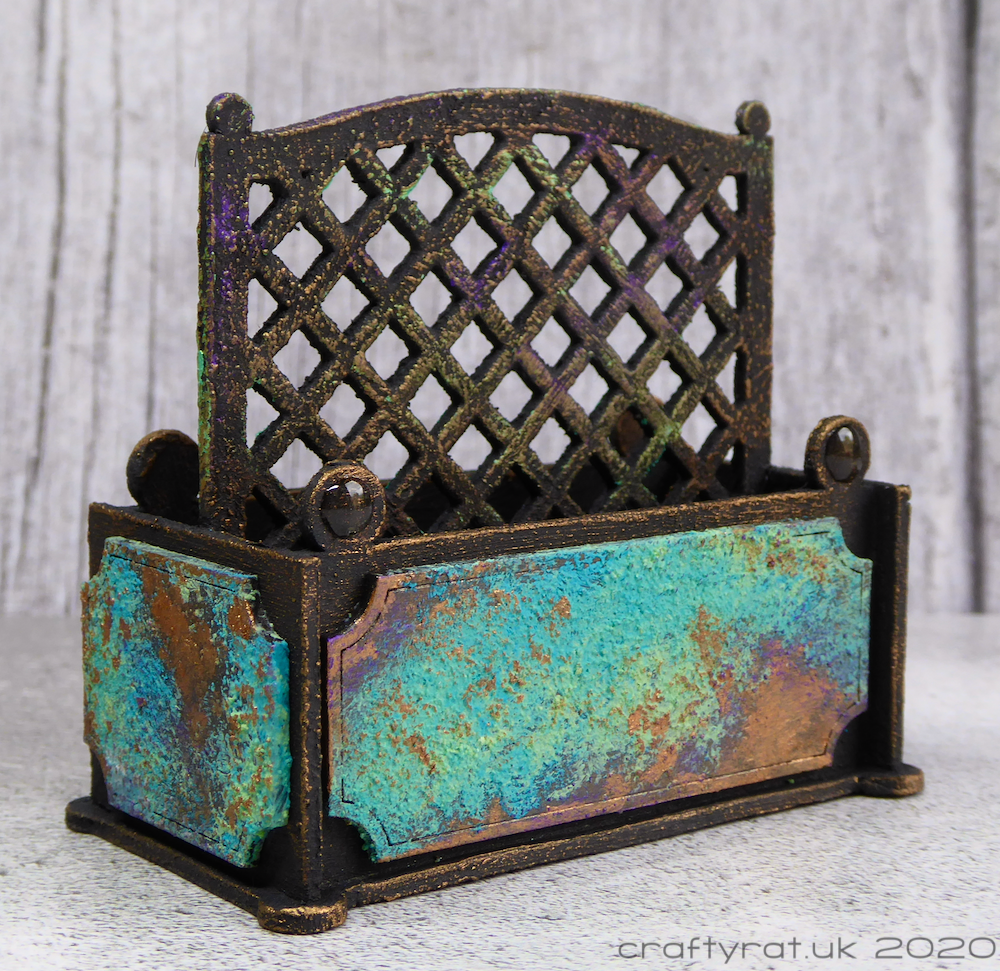 A corner-on view of the model planter.