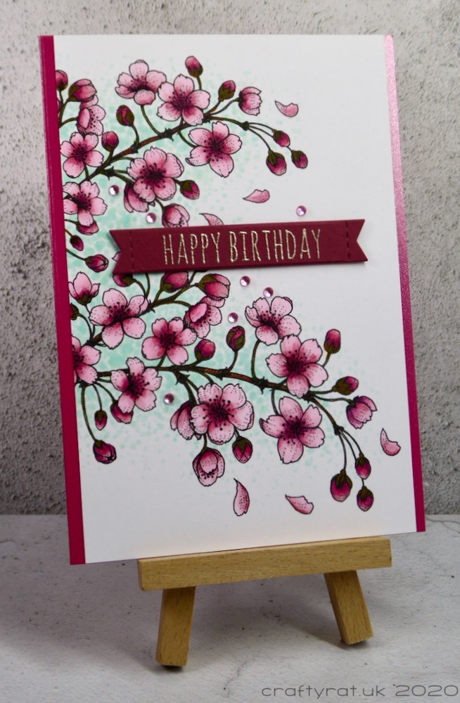 The card displayed on a small wooden easel.