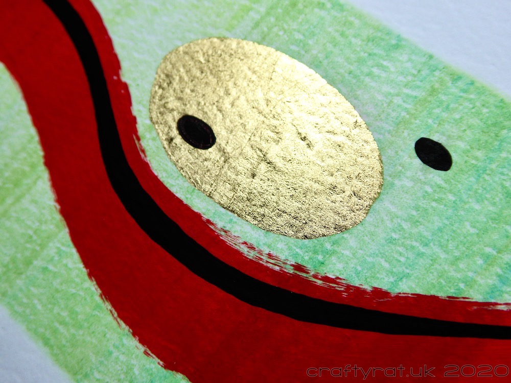 A close-up of the centre of the painting showing the light reflecting off the gilded oval.