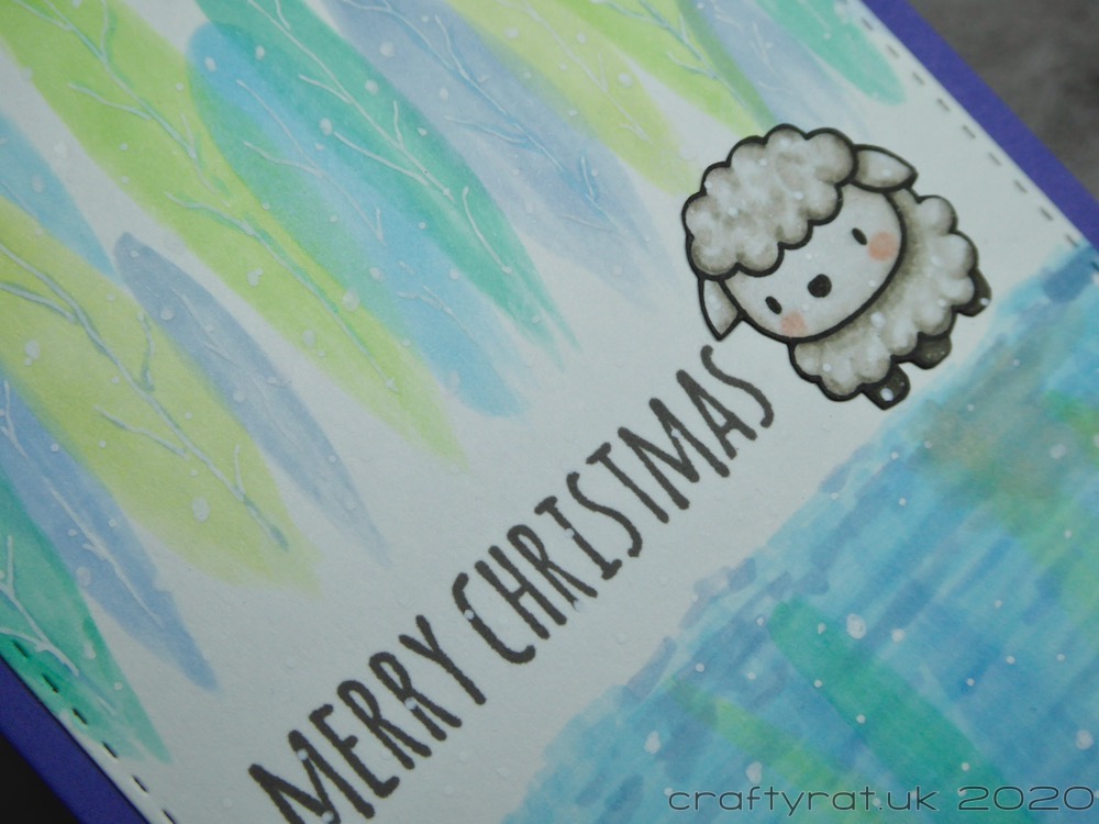 Close-up of the sheep and centre of the card.