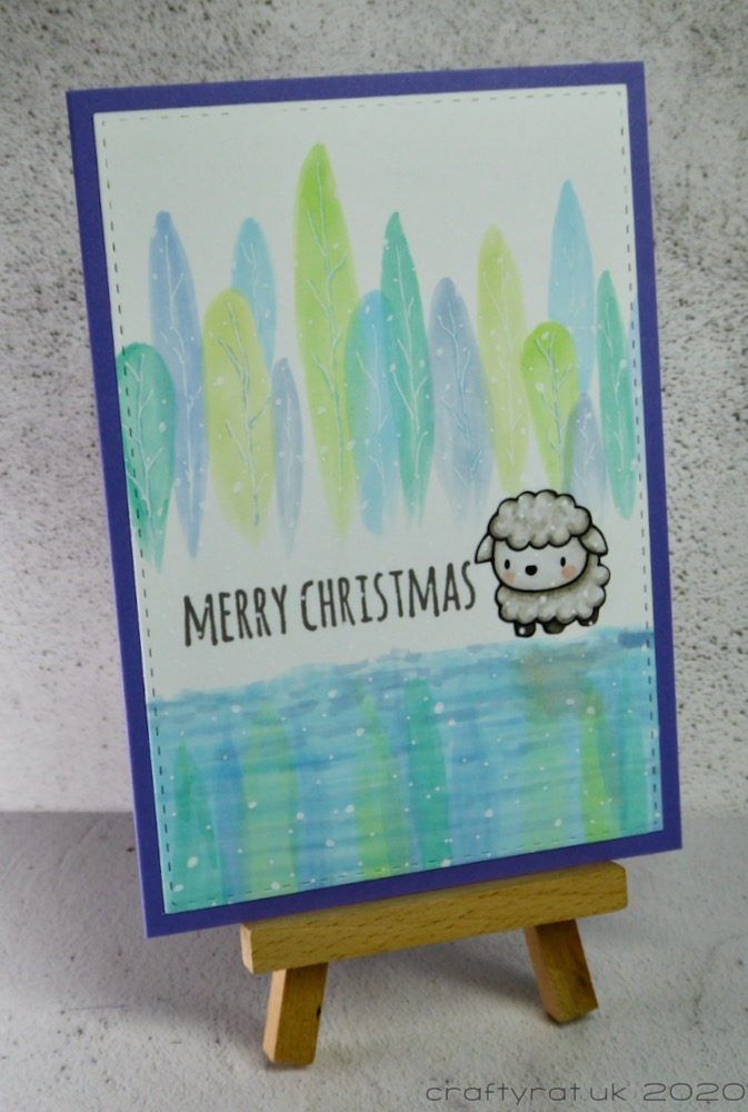 The card displayed on a small wooden easel.