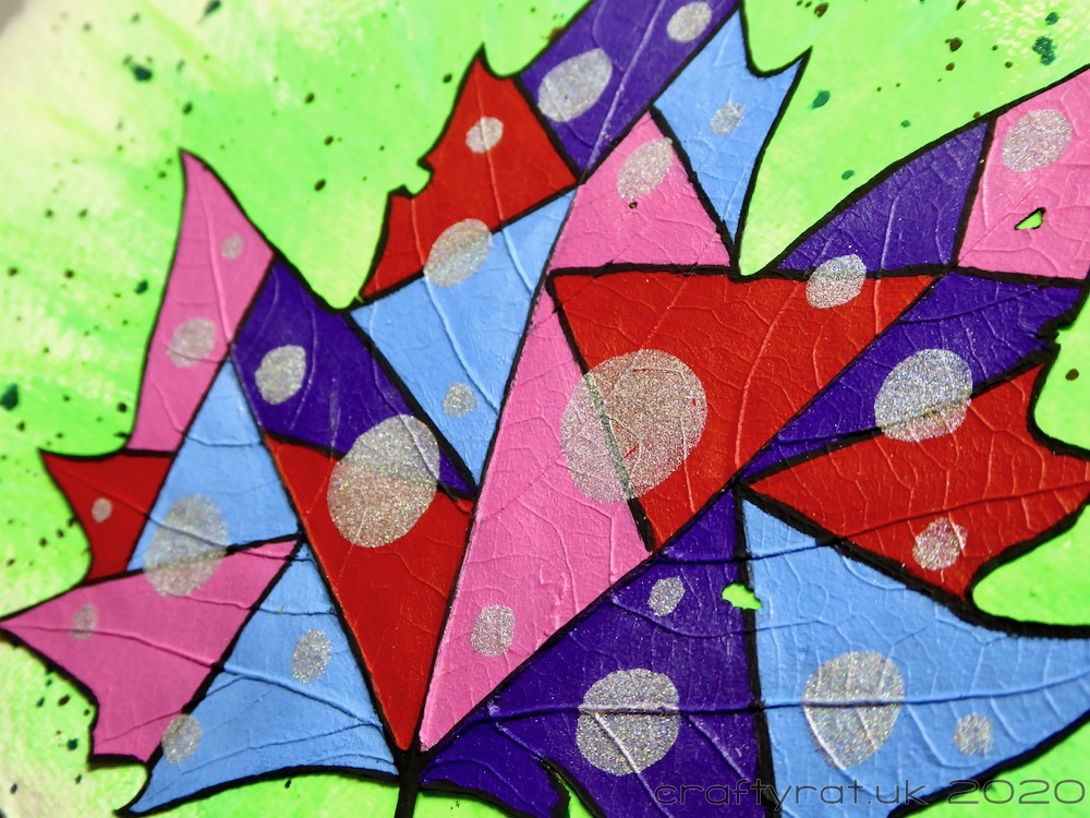 Close-up of the painted leaf.