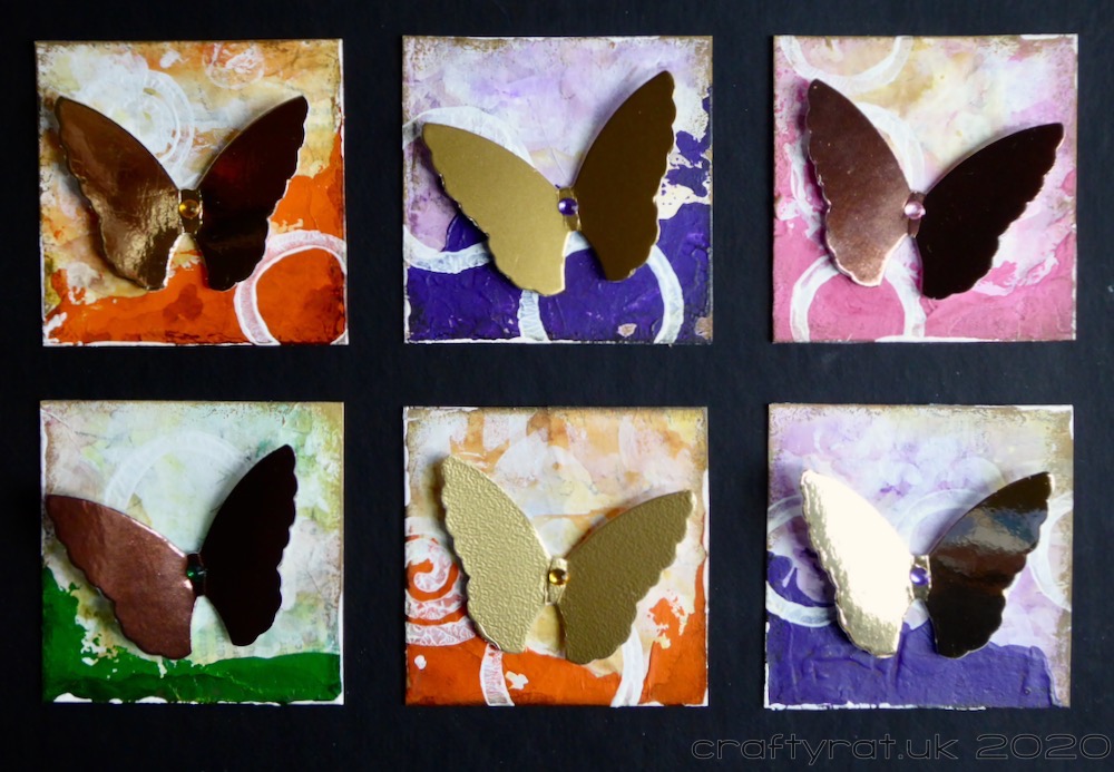 A close-up of six of the butterfly squares.