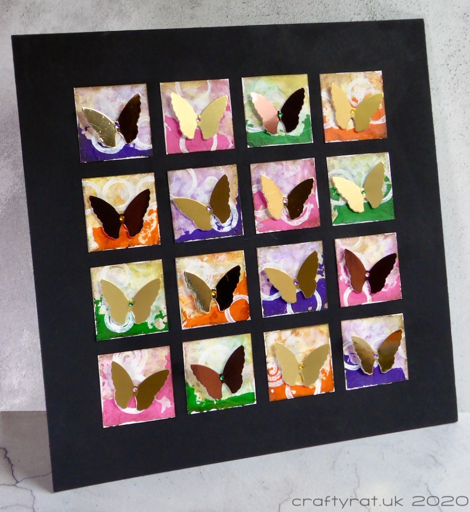 The butterfly grid displayed at an angle to show the dimension of the butterflies.