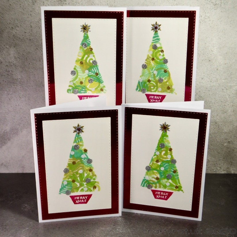 All four variants of the Christmas tree card.