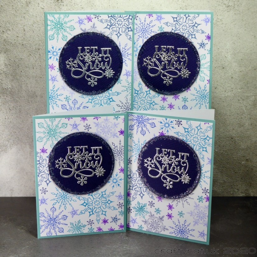 All four of the variants of the Christmas card.