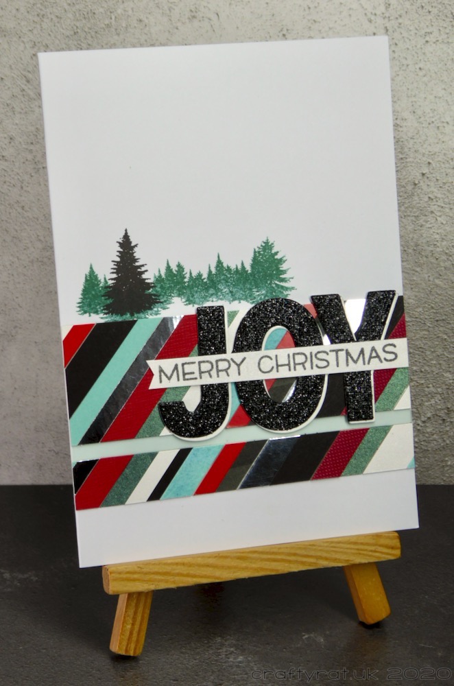 The card displayed on a small wooden easel.