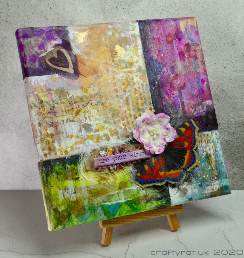 The canvas displayed on a small wooden easel.