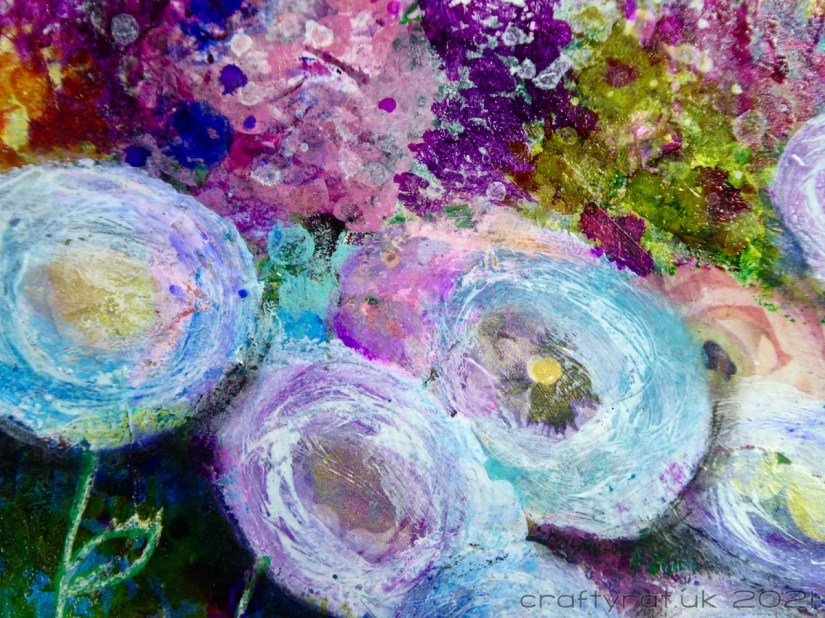 Close-up of the round flowers and background texture.