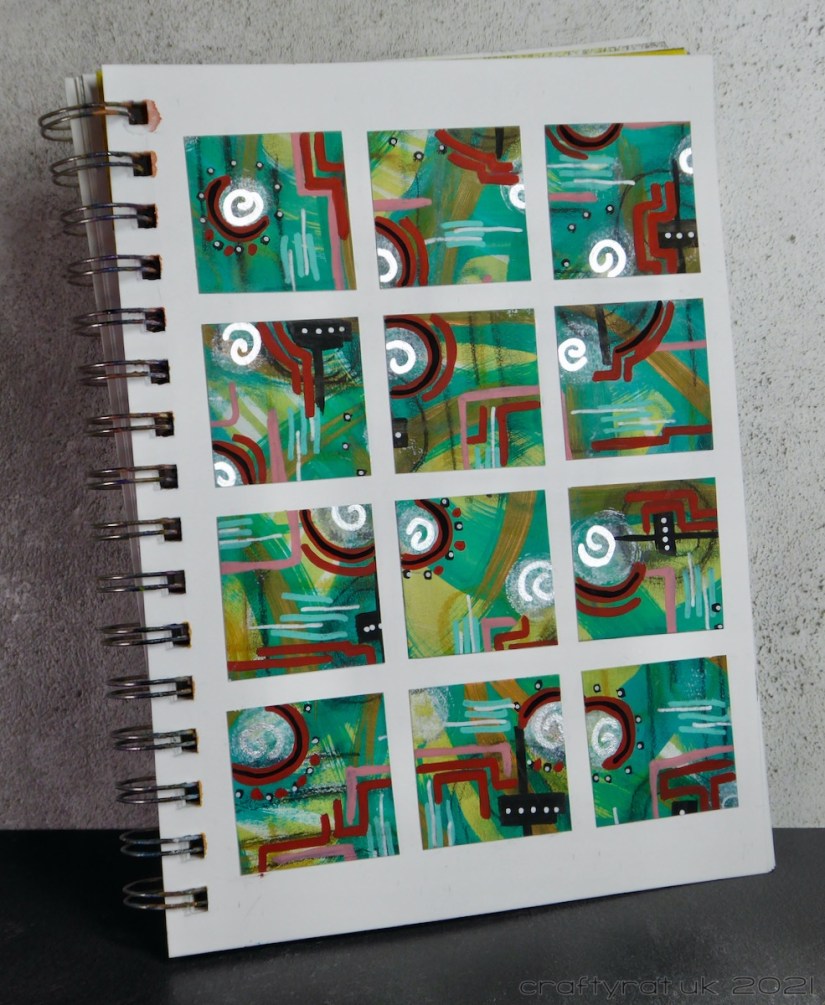The art journal page displayed at an angle.