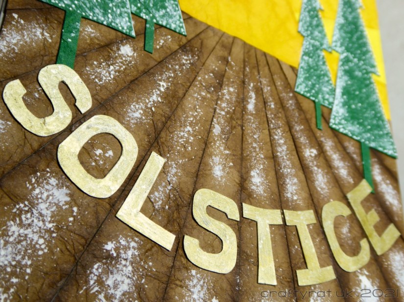 Close-up of the solstice word on the snowy field.