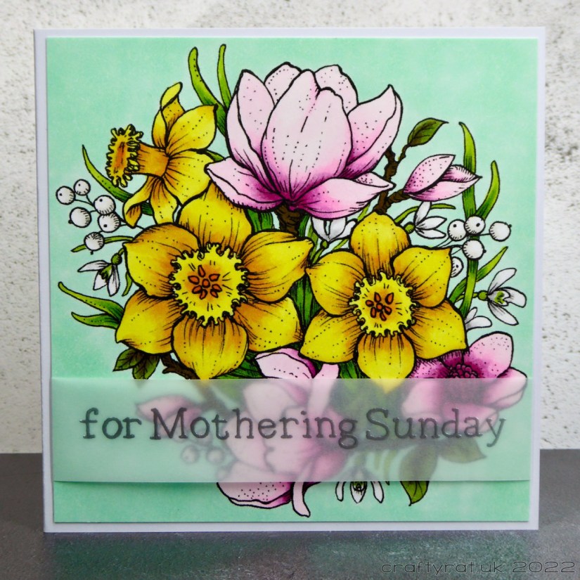 A Mother's Day card with Copic-coloured pink magnolia blossoms and yellow daffodils.