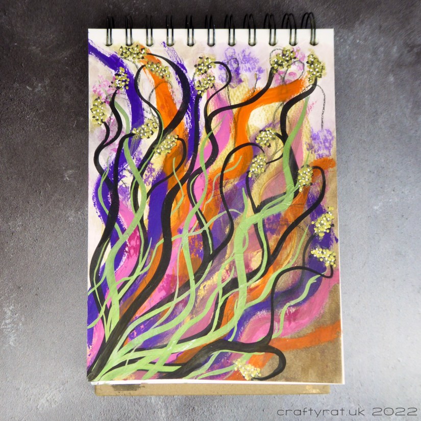 An abstract art journal page built up of wavy fronds in purple, orange, pink, black and pale green.